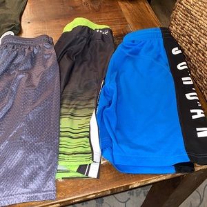 8 pairs of boys shorts and 1 t shirt